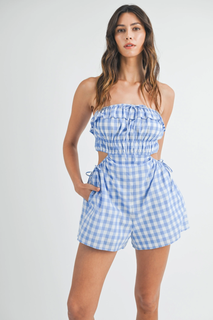 model wearing plad/checkered design one piece